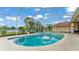Enclosed pool with a spa and plenty of foliage and trees at 2202 Hickory Ridge Dr, Valrico, FL 33596