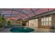 Relaxing screened-in pool area with covered lanai, perfect for outdoor entertaining at 2202 Hickory Ridge Dr, Valrico, FL 33596