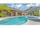 Beautiful backyard pool and jacuzzi are enclosed with see-through roof for year round enjoyment at 2202 Hickory Ridge Dr, Valrico, FL 33596