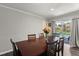 Dining area with pool view, wood flooring and seating for six at 2584 58Th S Ave, St Petersburg, FL 33710