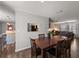 Dining room with wood table and chairs, open to living areas at 2584 58Th S Ave, St Petersburg, FL 33710