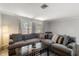 Comfortable living room area featuring a large sectional sofa and natural light at 2584 58Th S Ave, St Petersburg, FL 33710