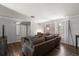 Cozy living room area with wood flooring, gray walls and ample natural light at 2584 58Th S Ave, St Petersburg, FL 33710