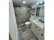 Contemporary bathroom featuring walk in shower, and elegant vanity at 2625 State Road 590 # 1512, Clearwater, FL 33759
