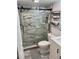 Modern bathroom with glass-enclosed shower, sleek vanity, and stylish fixtures at 2625 State Road 590 # 1512, Clearwater, FL 33759