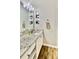 Bathroom featuring granite countertops, modern faucet, vanity, and built-in shelving at 27312 Edenfield Dr, Wesley Chapel, FL 33544