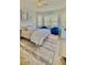 Inviting bedroom featuring natural light, a ceiling fan, and comfortable decor at 27312 Edenfield Dr, Wesley Chapel, FL 33544
