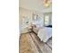 Cozy bedroom with neutral tones, ample natural light, and stylish furnishings at 27312 Edenfield Dr, Wesley Chapel, FL 33544