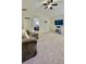 Large bonus room features neutral carpet and plenty of space for a flexible layout at 27312 Edenfield Dr, Wesley Chapel, FL 33544