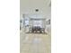 Well-lit dining room with an elegant chandelier, and decorative accents at 27312 Edenfield Dr, Wesley Chapel, FL 33544