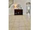 Dark wood cabinet in the dining area provides storage and charm at 27312 Edenfield Dr, Wesley Chapel, FL 33544