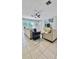 Bright and open living room with tile flooring and large windows at 27312 Edenfield Dr, Wesley Chapel, FL 33544