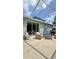 Enjoy outdoor living on this patio, complete with comfortable seating and space for entertaining at 27312 Edenfield Dr, Wesley Chapel, FL 33544