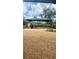Community playground with slides, climbing structures, and seating, ideal for outdoor activities at 27312 Edenfield Dr, Wesley Chapel, FL 33544