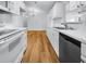 Modern kitchen with white cabinets, updated appliances, and sleek countertops at 2908 Lockwood Meadows Blvd, Sarasota, FL 34234