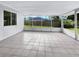 Enclosed patio, featuring tiled flooring, that offers an outdoor seating area at 2908 Lockwood Meadows Blvd, Sarasota, FL 34234
