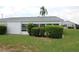 Beautiful backyard with privacy shrubs and open space for outdoor activities at 402 Dorchester Pl # 44, Sun City Center, FL 33573