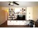 Cozy living room featuring custom built-in shelves and cabinets at 402 Dorchester Pl # 44, Sun City Center, FL 33573