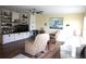 Inviting living room with hard surface floors and built-in storage at 402 Dorchester Pl # 44, Sun City Center, FL 33573