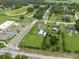 Aerial shot displaying the property's proximity to local amenities, horse track, and neighboring residences at 40449 Trotter Ln, Dade City, FL 33525