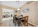 Dining area with views into the living room offers a stylish space for meals and gatherings at 40449 Trotter Ln, Dade City, FL 33525