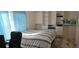 Inviting bedroom featuring a queen-sized bed and closet for ample storage at 4215 E Bay Dr # 1506C, Clearwater, FL 33764