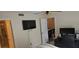 Bedroom featuring a desk, closet, and open doorway at 4215 E Bay Dr # 1506C, Clearwater, FL 33764