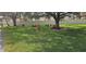 Community park featuring picnic tables, mature trees, and green space for outdoor enjoyment at 4215 E Bay Dr # 1506C, Clearwater, FL 33764