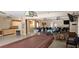 Spacious community room featuring a pool table and tables for activities and gatherings at 4215 E Bay Dr # 1506C, Clearwater, FL 33764