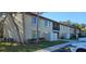 Inviting exterior view of condos, featuring well-maintained landscaping and assigned parking at 4215 E Bay Dr # 1506C, Clearwater, FL 33764