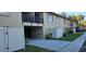 Well-maintained exterior with lush landscaping, private patios, and assigned parking at 4215 E Bay Dr # 1506C, Clearwater, FL 33764