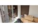 View of condo patio with sliding glass door and extra storage at 4215 E Bay Dr # 1506C, Clearwater, FL 33764