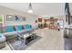Spacious living area showcasing open layout and tiled floors connecting kitchen and living room area at 4703 Somerset Hill Ln, Riverview, FL 33578