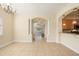 The dining area offers an open design, with decorative columns, and provides access to the kitchen and other living areas at 4760 Wheel House Dr, New Port Richey, FL 34652