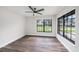 Bright bedroom features luxury floors, large windows and neutral paint at 513 Sportsman Park Dr, Seffner, FL 33584