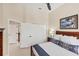 Well-lit bedroom with white closet doors, neutral walls, and calming artwork at 5217 88Th E St, Bradenton, FL 34211