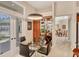 Breakfast nook with glass table, pendant lighting, and views of the patio and backyard at 5217 88Th E St, Bradenton, FL 34211