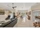 Spacious living room with high ceilings, tile floors, and plenty of natural light, perfect for relaxing and entertaining at 5217 88Th E St, Bradenton, FL 34211