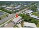 Aerial view of the stilt home in a neighborhood near the water at 6924 Americana Ne Dr # 167, St Petersburg, FL 33702