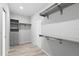 Spacious walk-in closet with custom shelving for ample storage at 6924 Americana Ne Dr # 167, St Petersburg, FL 33702