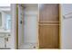 Tiled shower with glass doors in a bathroom with a white vanity and sink at 700 Starkey Rd # 1145, Largo, FL 33771