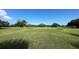 Expansive green golf course with mature trees, providing a serene and picturesque setting at 700 Starkey Rd # 1145, Largo, FL 33771
