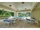 Covered poolside seating area offers residents a comfortable space to relax and enjoy the community pool at 700 Starkey Rd # 1145, Largo, FL 33771