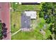 High angle shot of house revealing rooftop and backyard features, set in a residential neighborhood at 812 W Orient St, Tampa, FL 33603