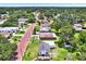 Charming neighborhood featuring single-Gathering homes on a tree-lined street, aerial view at 812 W Orient St, Tampa, FL 33603