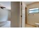 Hall bathroom includes a tiled shower with glass door at 8200 Westfield Dr, Port Richey, FL 34668