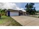 Charming single-story home with stone accents, two-car garage, and well-maintained landscaping at 8200 Westfield Dr, Port Richey, FL 34668