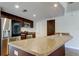 Modern kitchen boasts stainless steel appliances, counter seating, and plenty of space for cooking at 8200 Westfield Dr, Port Richey, FL 34668