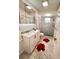 Clean bathroom featuring modern fixtures, a sleek vanity, and glass-enclosed shower at 8616 Pinafore Dr, New Port Richey, FL 34653