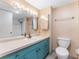 Cozy bathroom featuring an undermount sink, medicine cabinet, and a shower with a bathtub at 880 Mandalay Ave # C512, Clearwater Beach, FL 33767